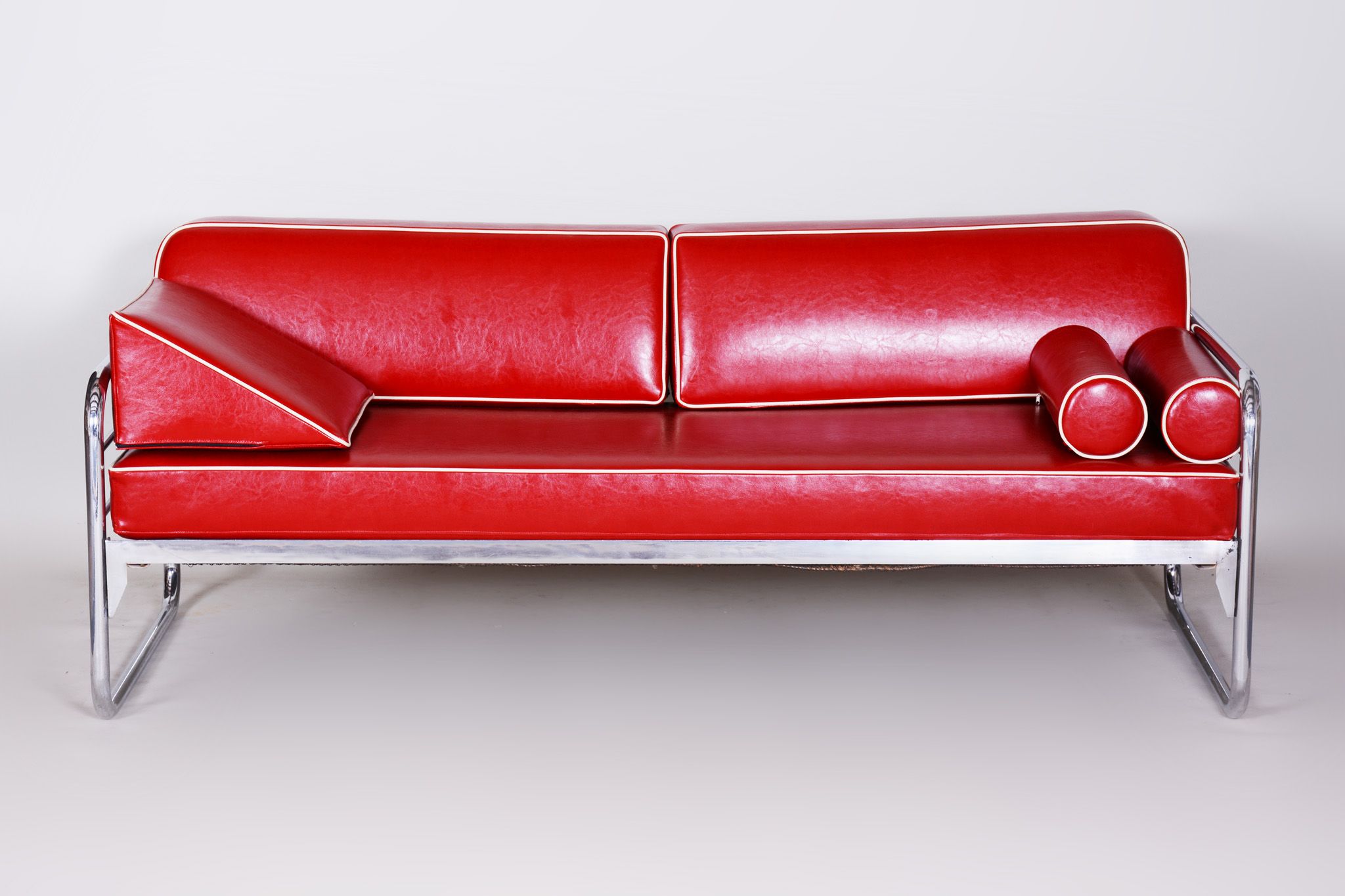 Red leather sofa by Hynekk Gottwald 1930