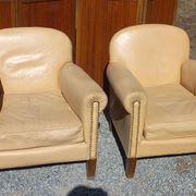 Pair of 1930s club armchairs in ivory leather.