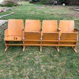 Vintage cinema bench for four people, brown varnished beech in Mid-Century style from the 1950s.