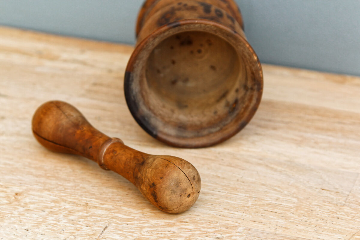 Ancient mortar and pestle, solid wood