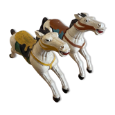 Pair of large hand-painted Indonesian horses with saddle