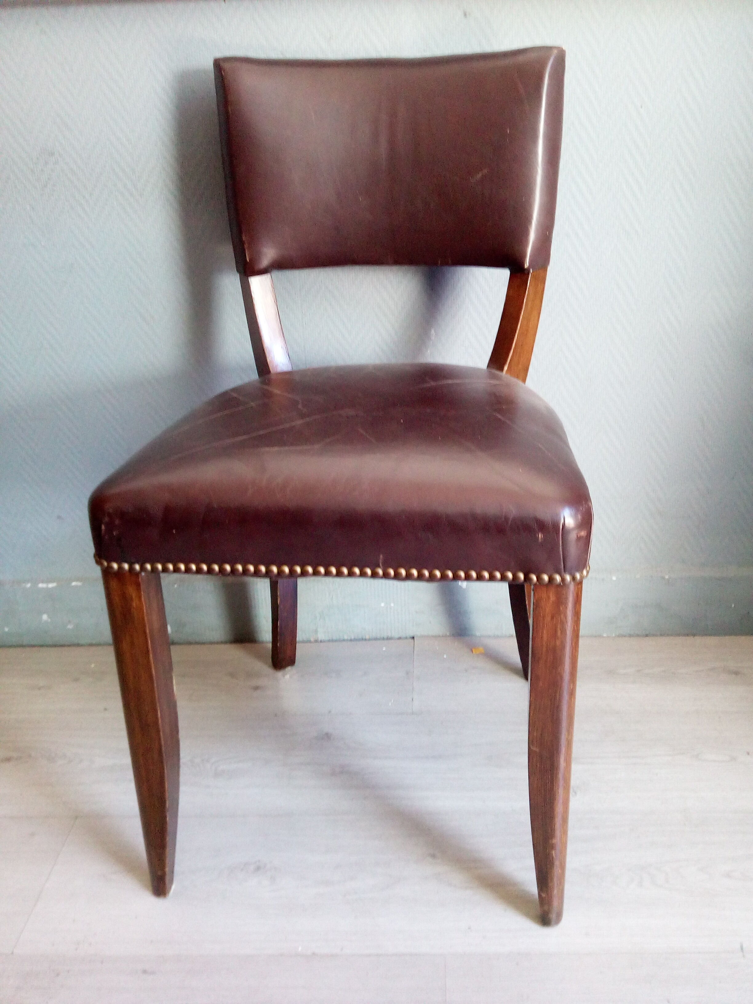 Lot of leather and vintage wood chairs