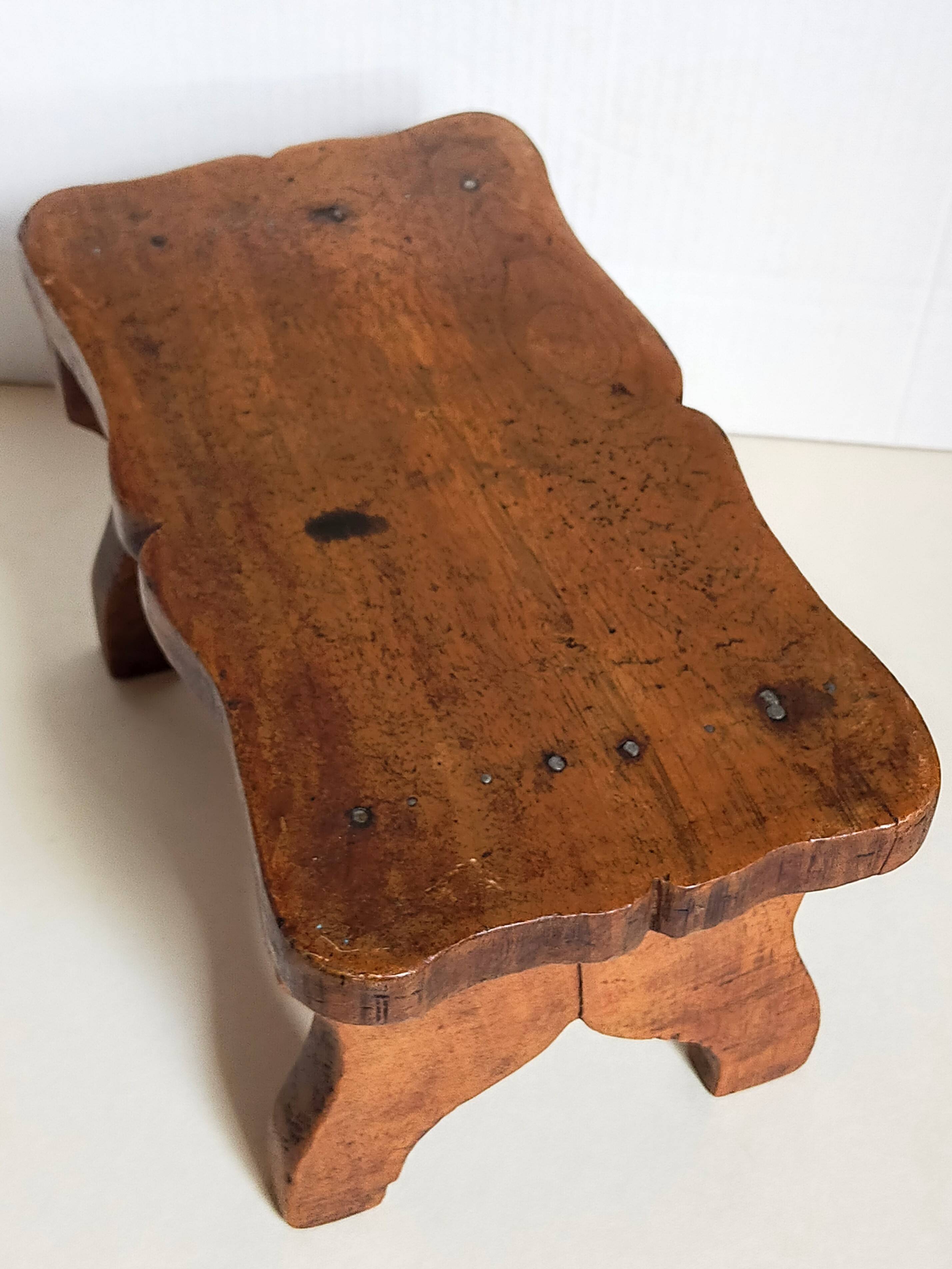Old solid wood footrest stool