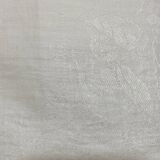 Old linen drapery with monogram and bird by Georges Braque