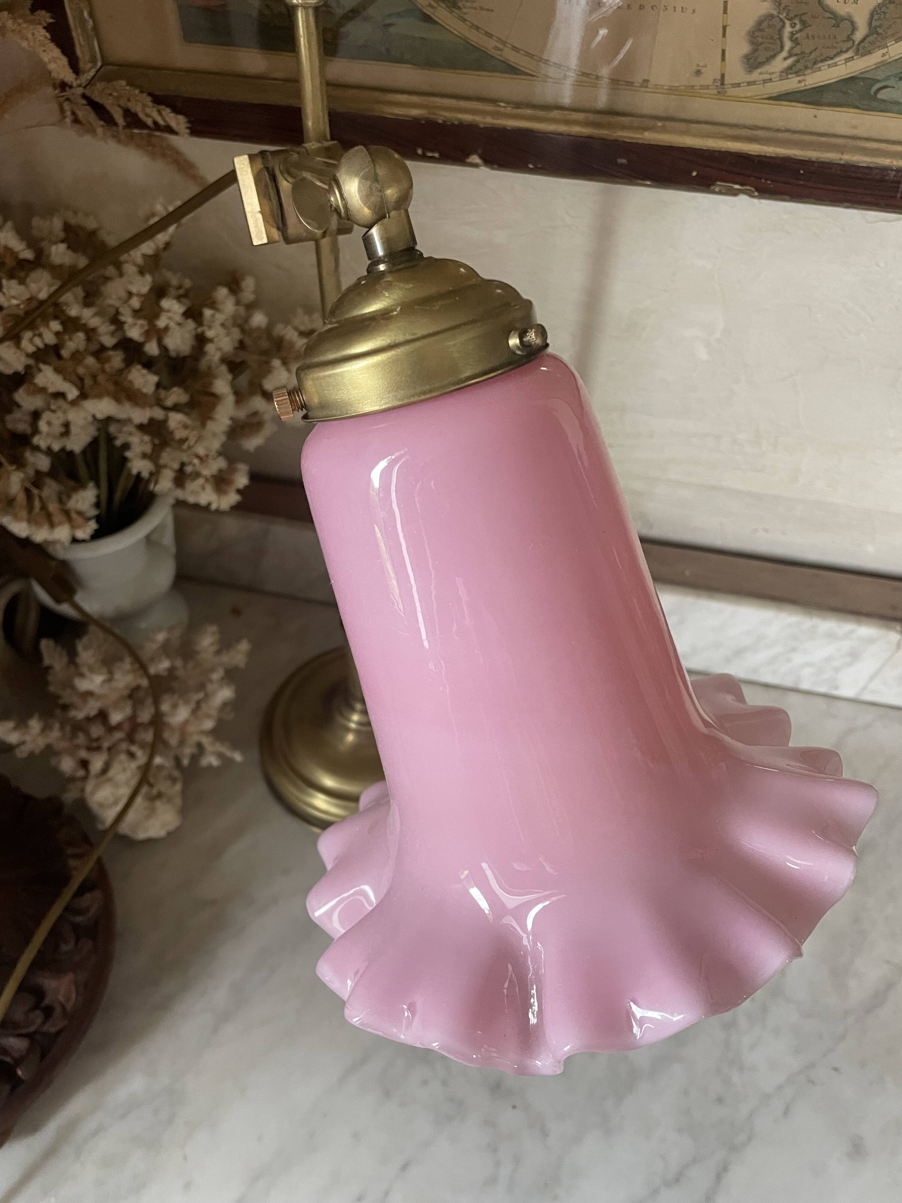 Large vintage lamp in brass with a pink opaline shade.