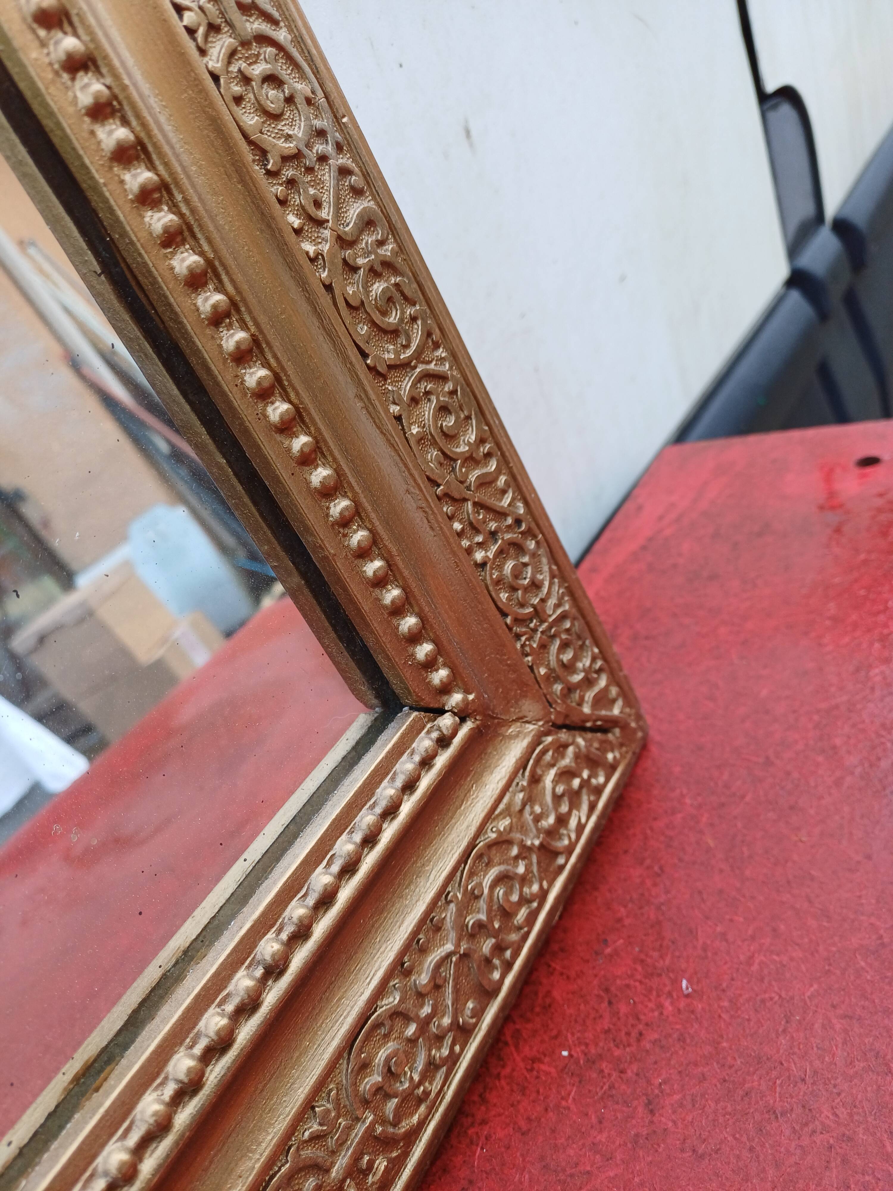 19th century wood and gilded stucco mirror