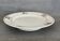 Plate on footstool Terre de Fer Salins Charbonnier