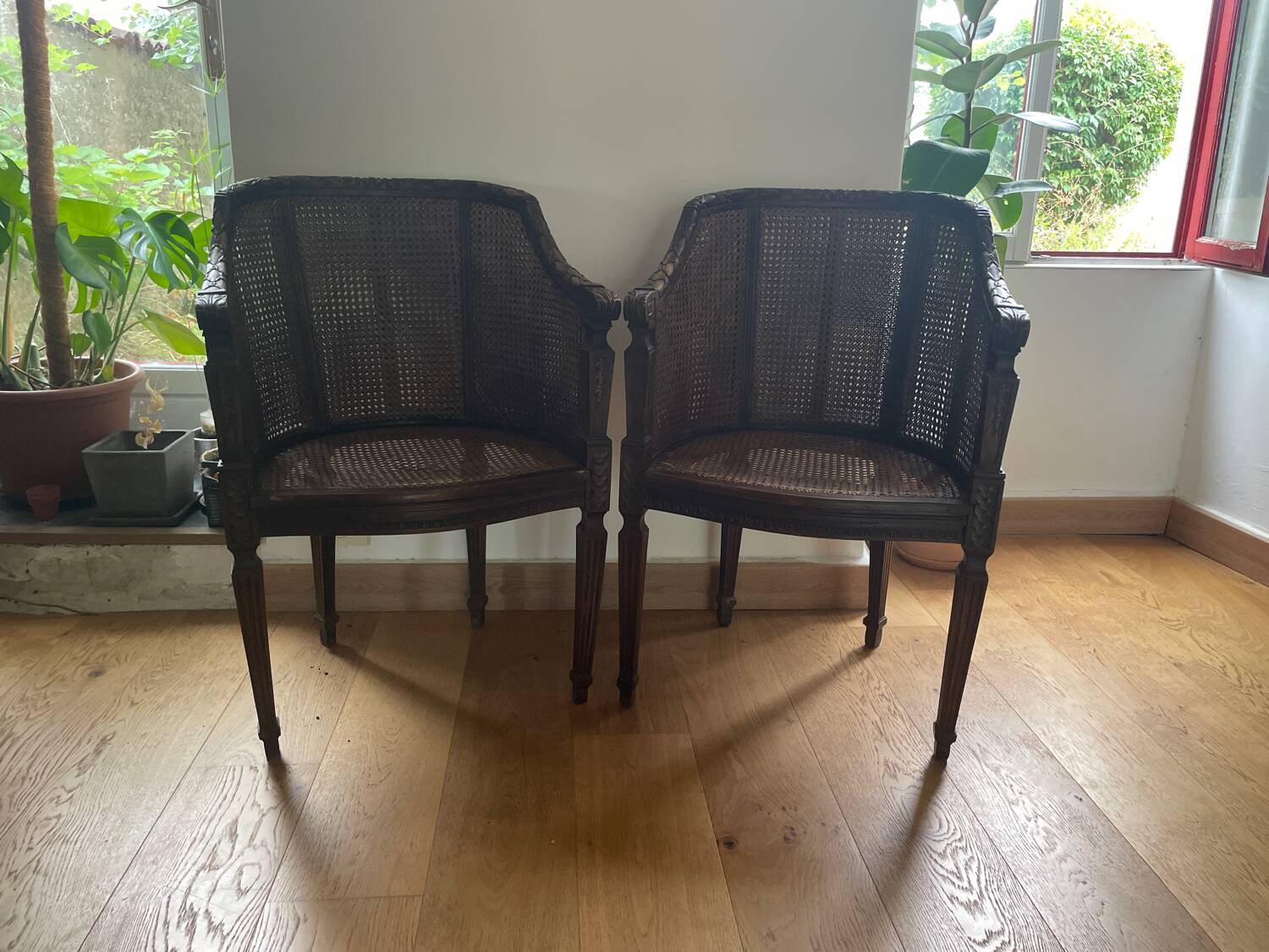 Pair of gondola armchairs in Louis XVI style with caning.