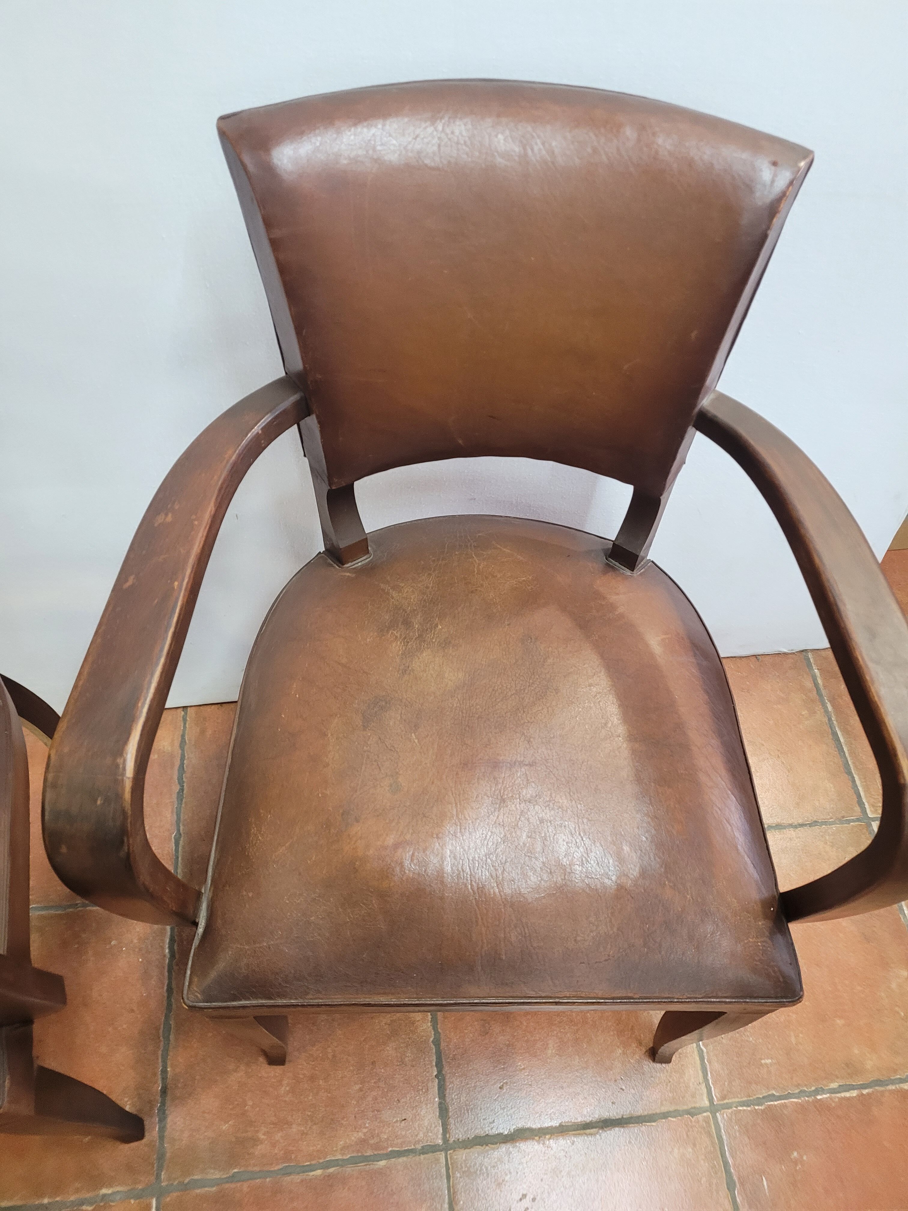 Paire de fauteuils bridge ancien en cuir