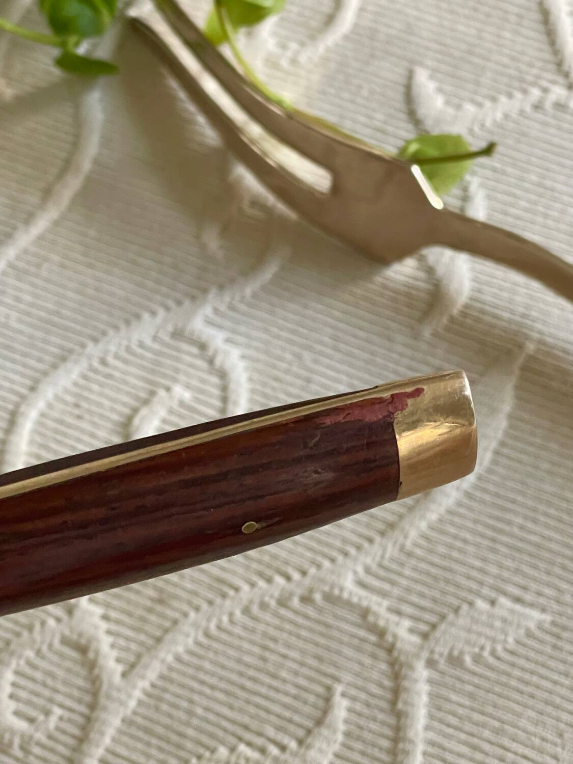 Service cutlery, brass and rosewood.