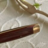 Service cutlery, brass and rosewood.