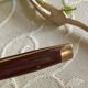 Service cutlery, brass and rosewood.
