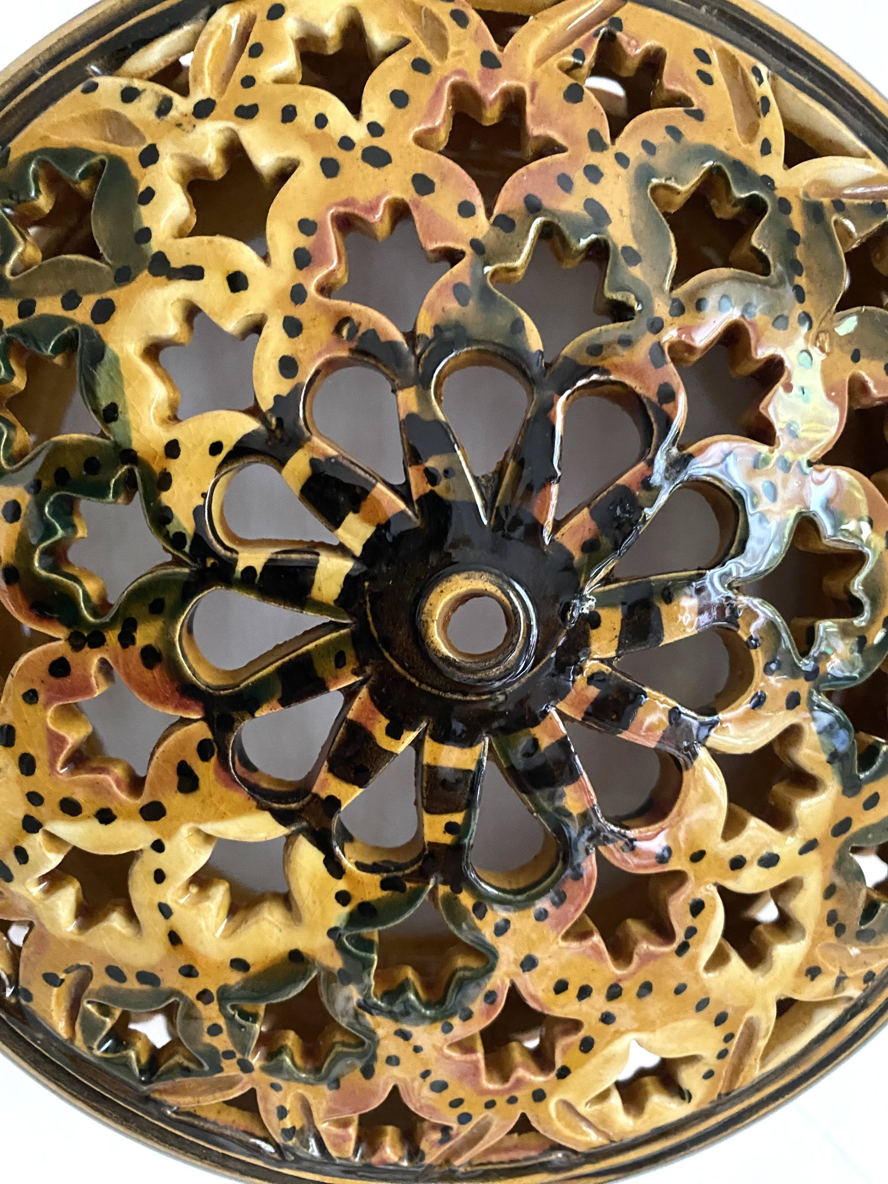 Pair of enamelled terracotta wall lights