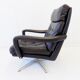 Danish black leather armchair with ottoman 70s
