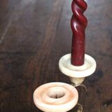 Pair of curved brass candlesticks with onyx
