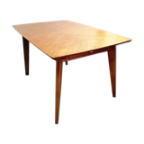 Dining table with compass feet