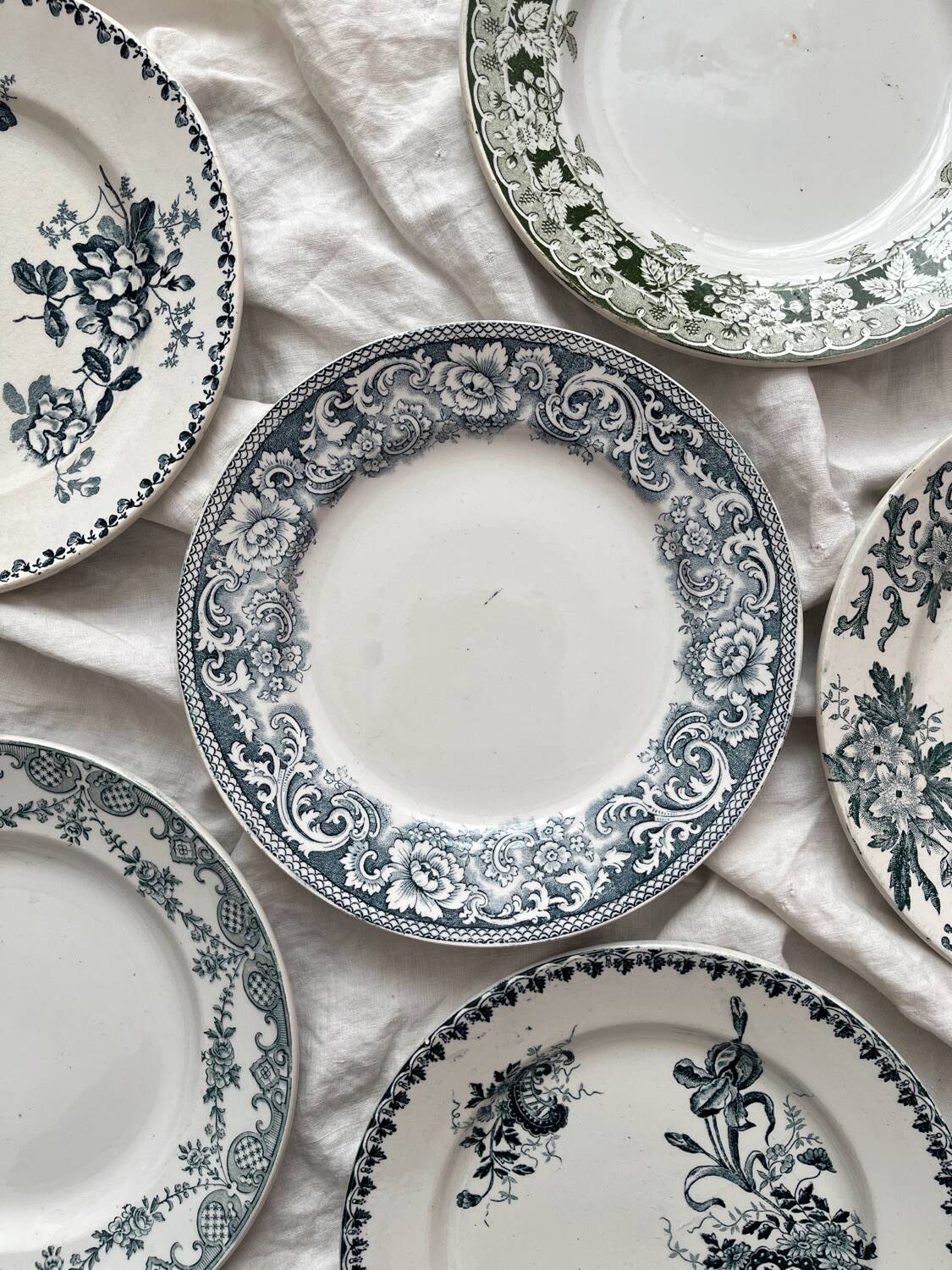 6 mismatched Saint Amand ironware dessert plates