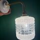 Vintage globe angled wall light in white and clear glass
