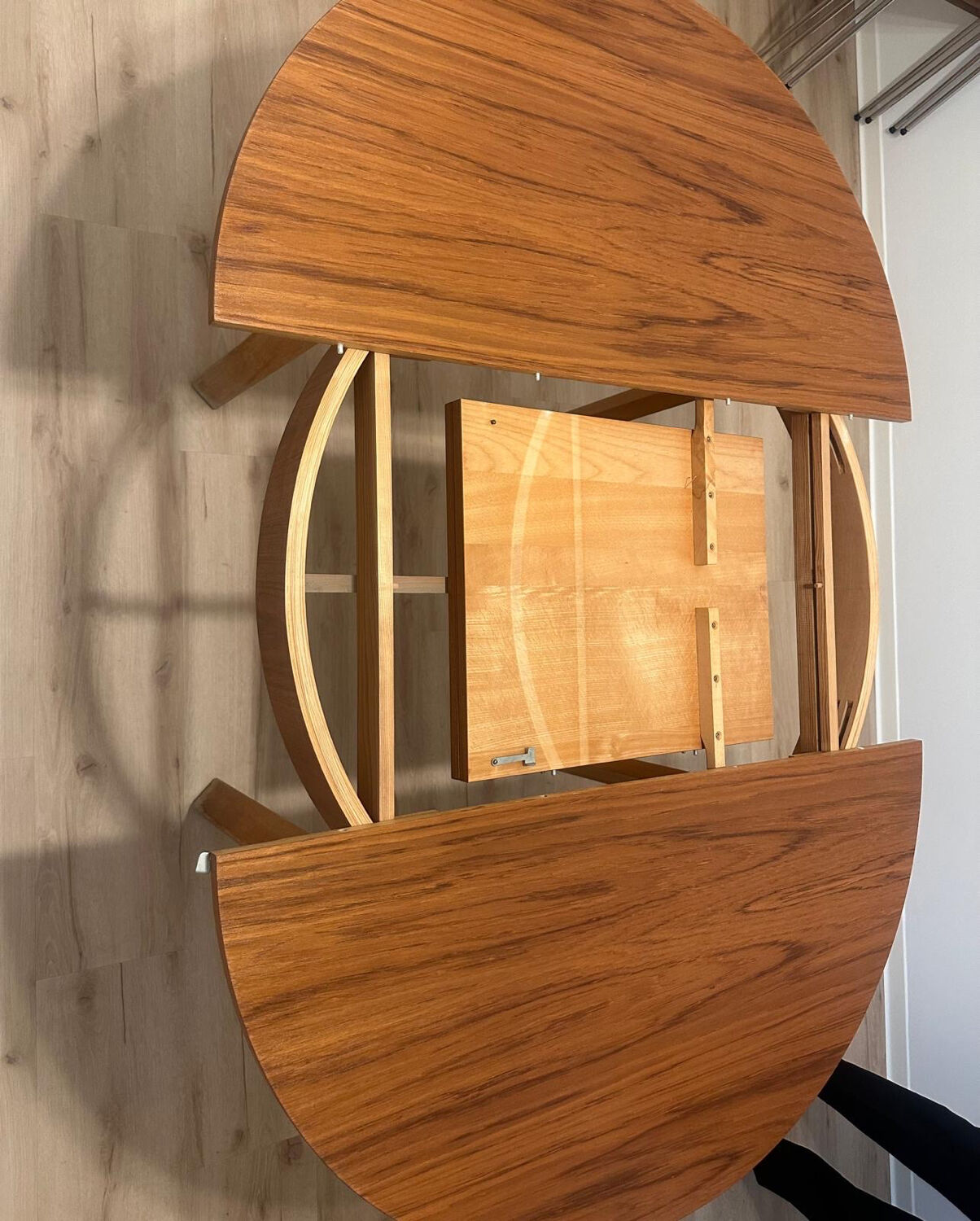 Wooden round table with butterfly extension from the 1970s.