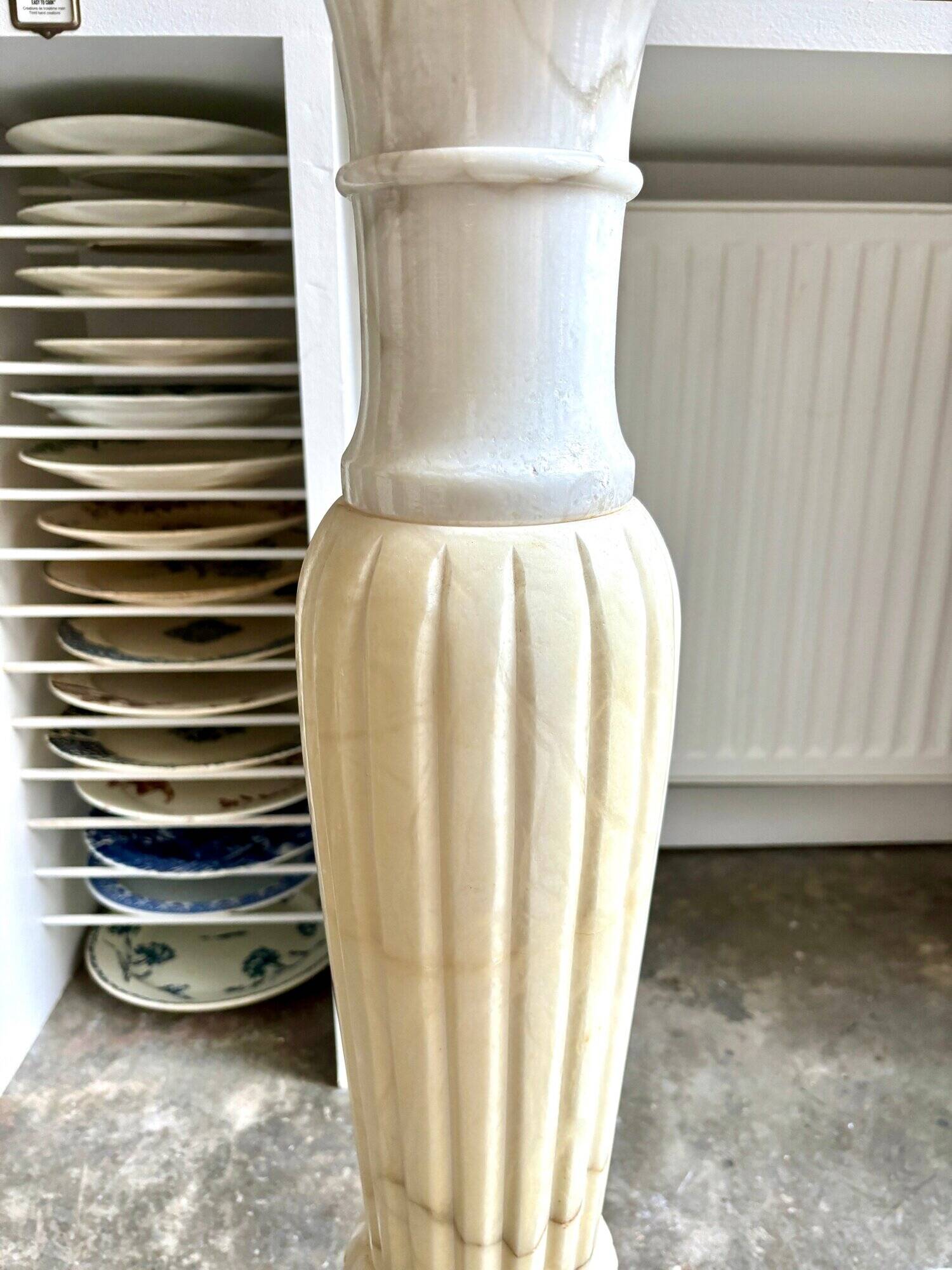 Column, illuminated alabaster saddle