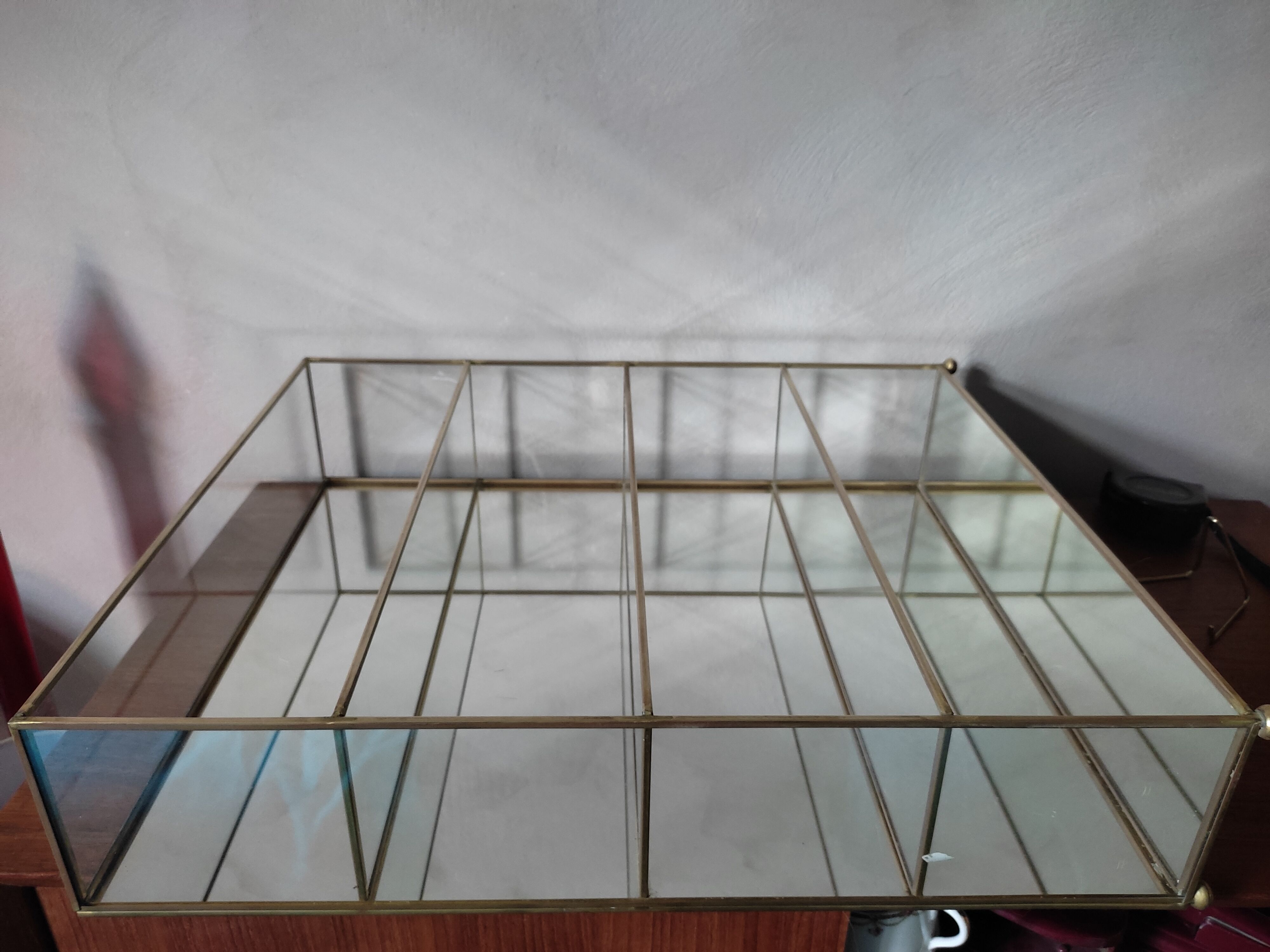 Glazed brass shelf to install