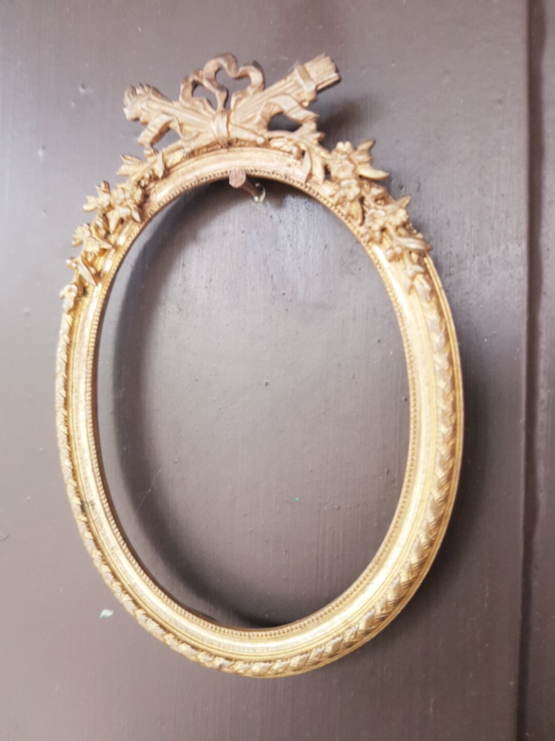 Old bronze oval format frame