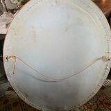 Golden oval mirror