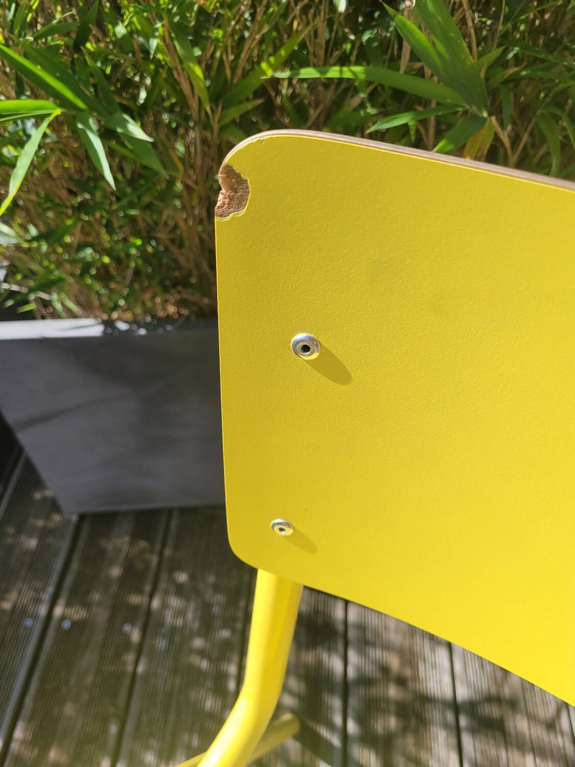 Pair of yellow plywood chairs