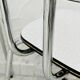 Set of two vintage grey Formica and chrome chairs.