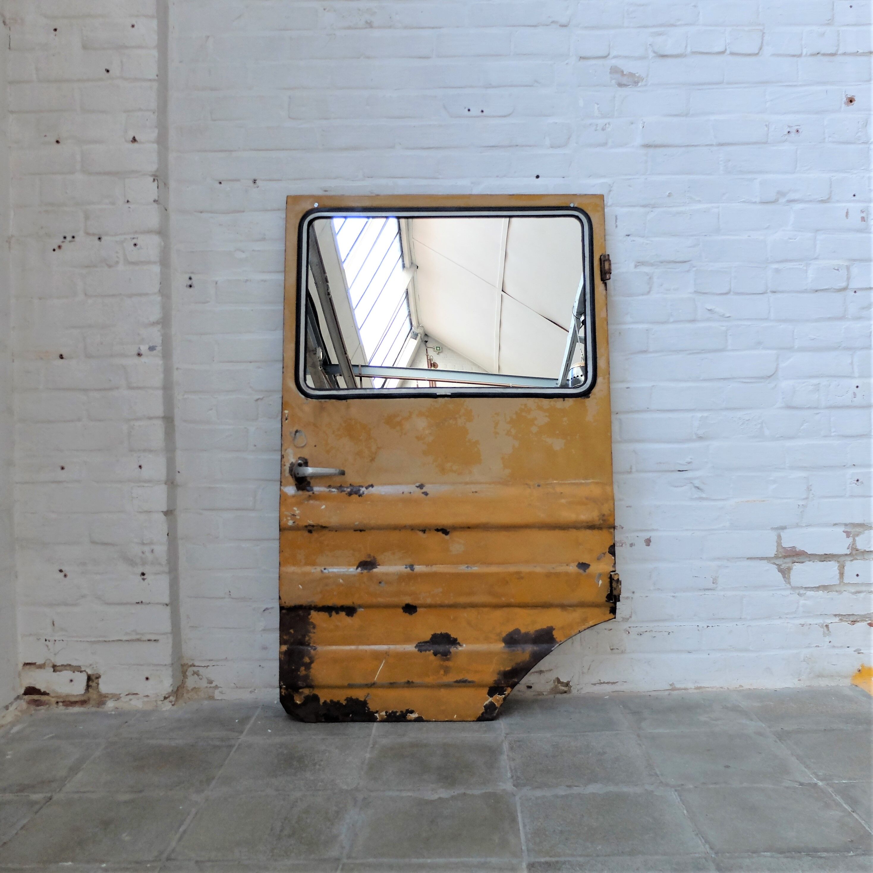 Yellow industrial mirror