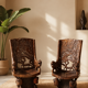 Pair of carved African armchairs