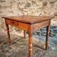 French vintage side table in cherry wood with a drawer.