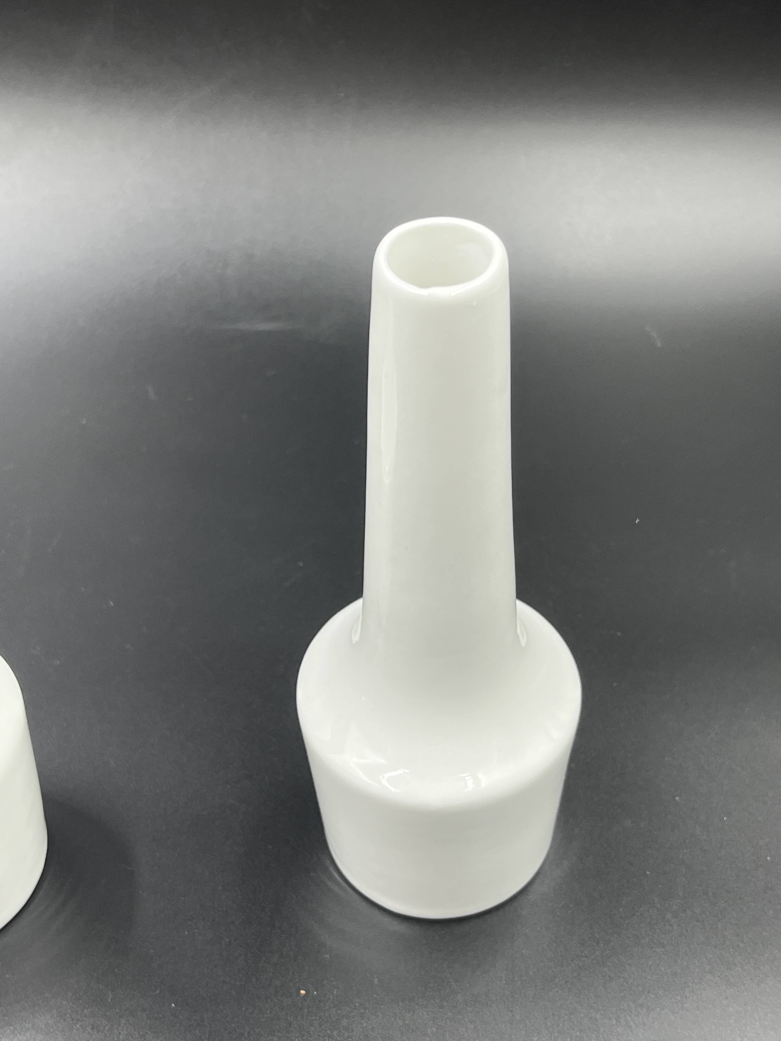 Pair of vintage white ceramic bud vases