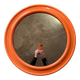 Mirror with round frame in orange molded plastic by carrara & matta, 1974