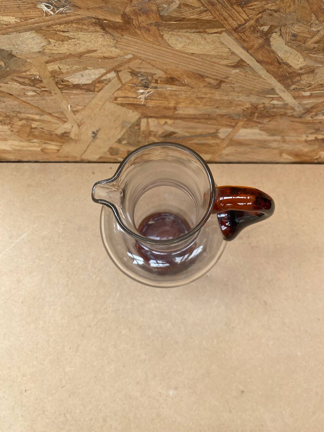 Antique clear blown glass pitcher + orange handle & foot vintage