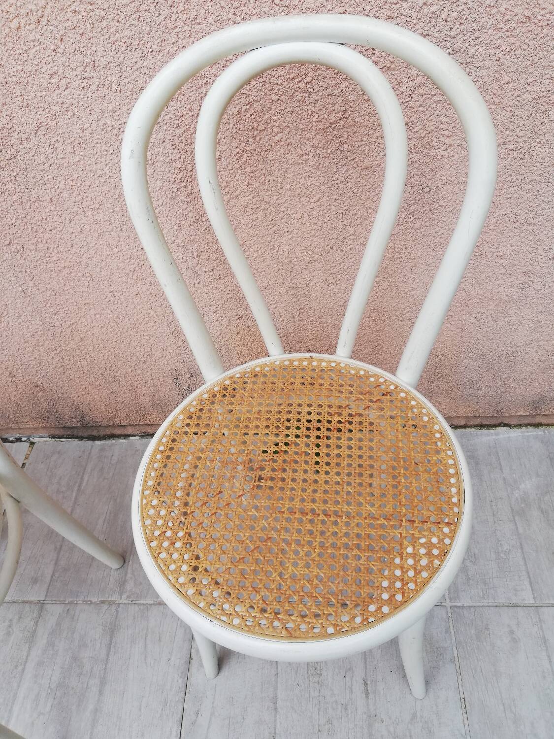 Lot of three Vintage ecru natural cane bistro chairs