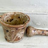 Pyrite sandstone mortar and its pestle
