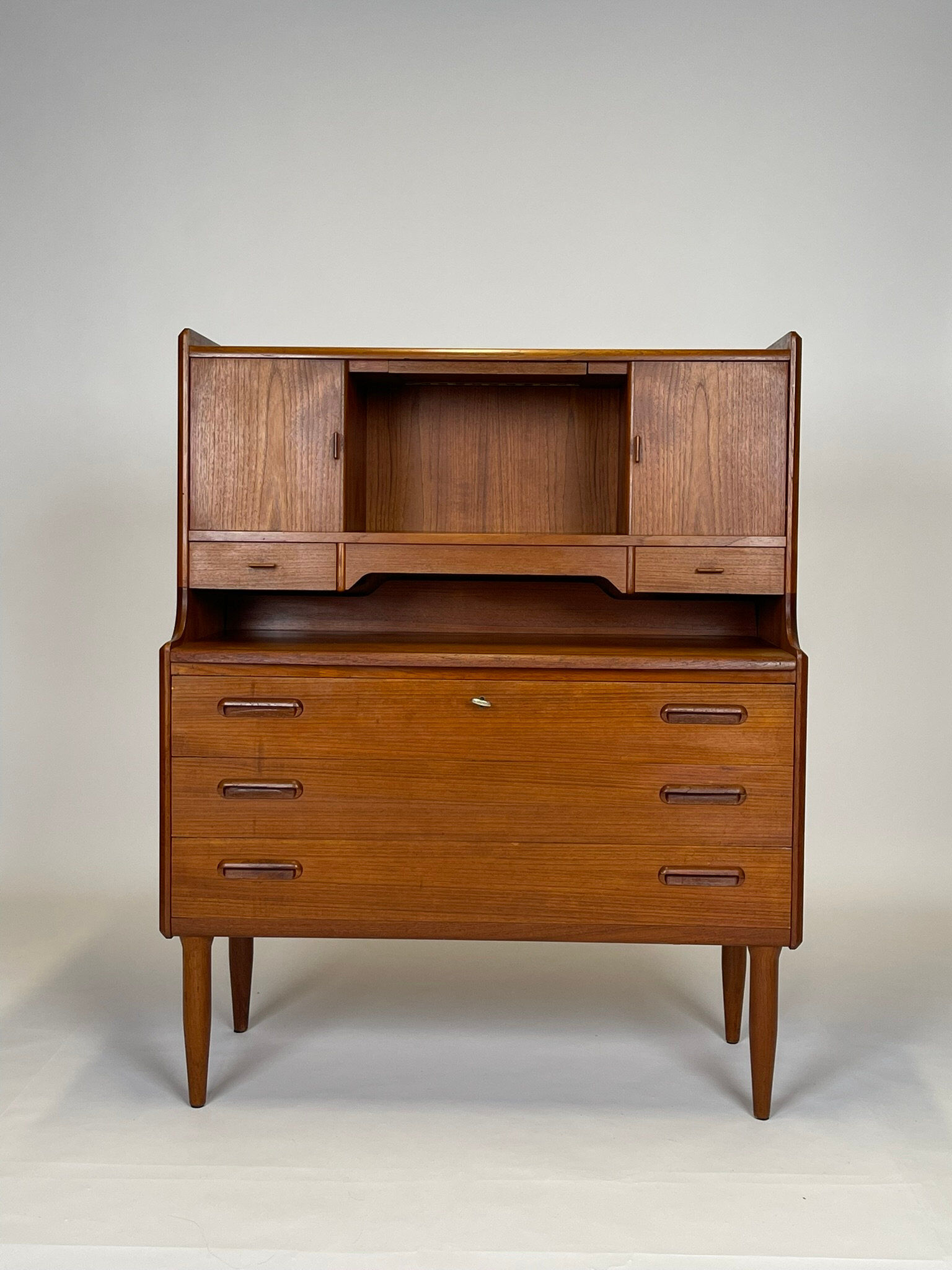 Teak grand secretary from the 1960s.