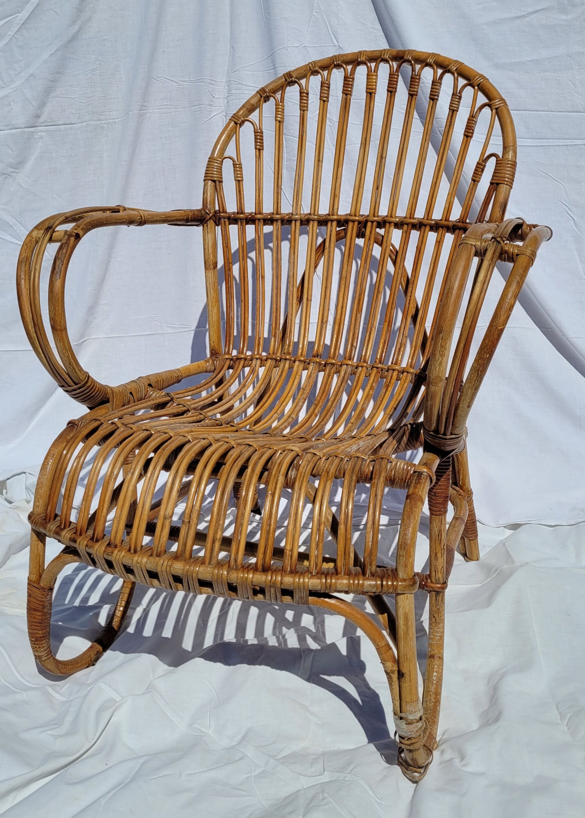 Adult rattan armchair TBE
