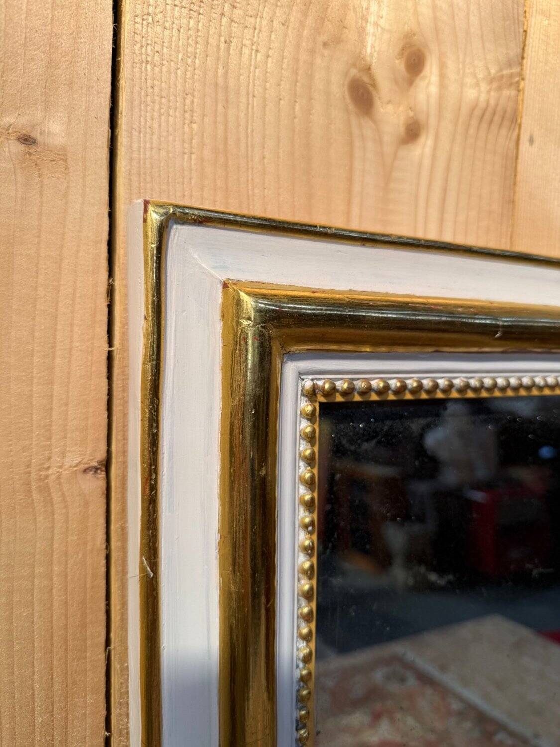 Mirror of the in-between – Louis XVI style – White lacquered and gilded with gold leaf