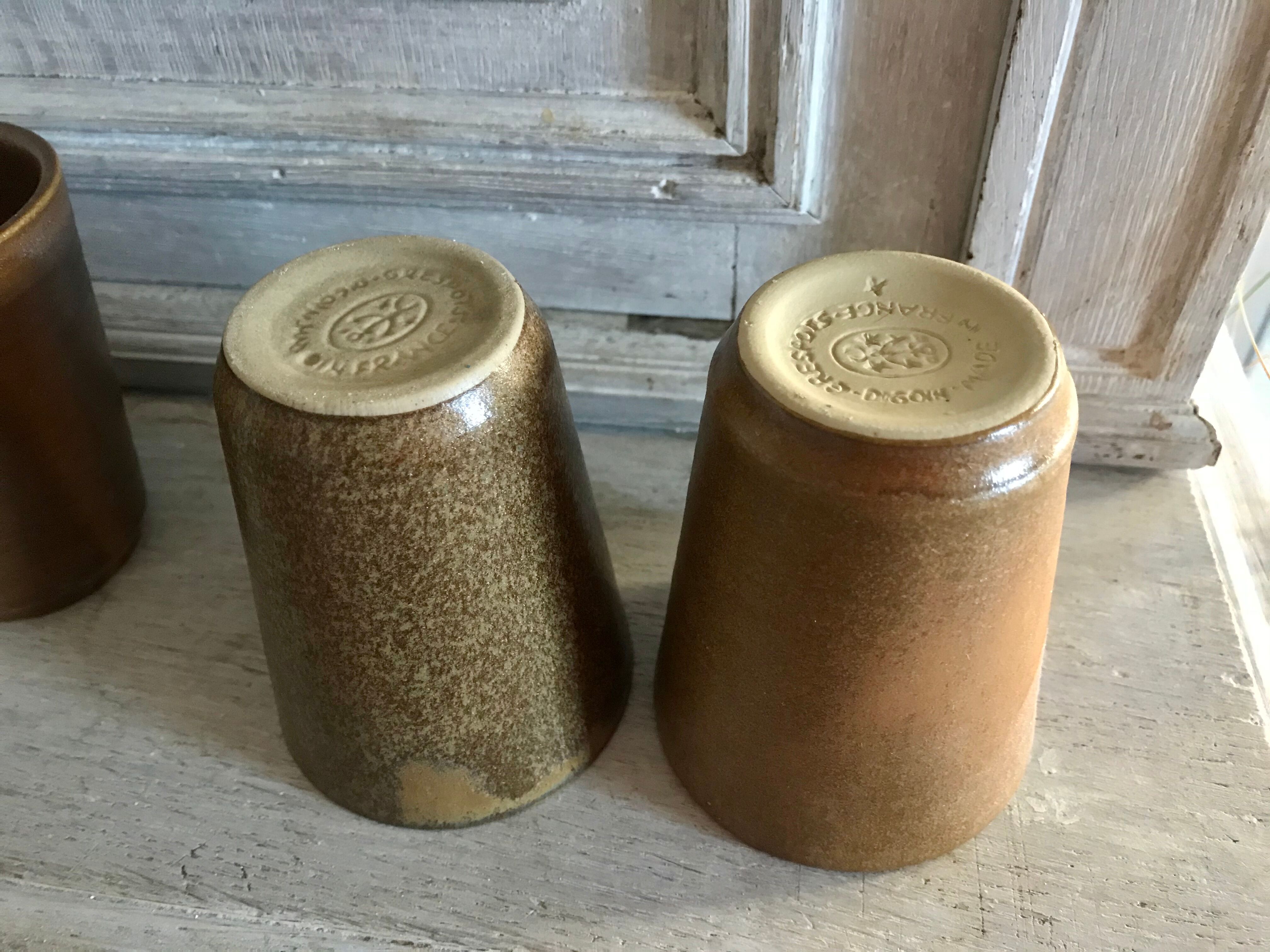 Lot of six Digoin mugs in sandstone