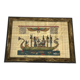 Egyptian papyrus under glass in wooden frame