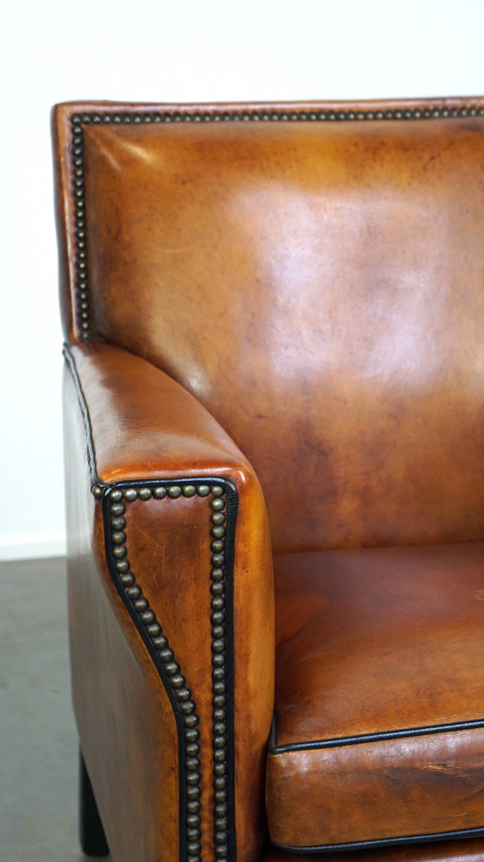 Sleek sheepskin Art Deco design armchair with beautiful details