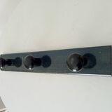 Vintage wall-mounted coat rack in lacquered wood from the 60s