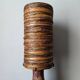 Table lamp with terracotta base and resin shade.