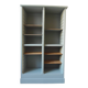 Vintage furniture transformed into a bookcase, verdigris patinated sideboard.