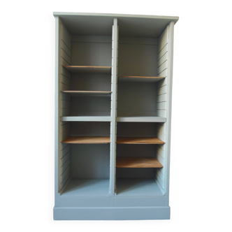 Vintage furniture transformed into a bookcase, verdigris patinated sideboard.