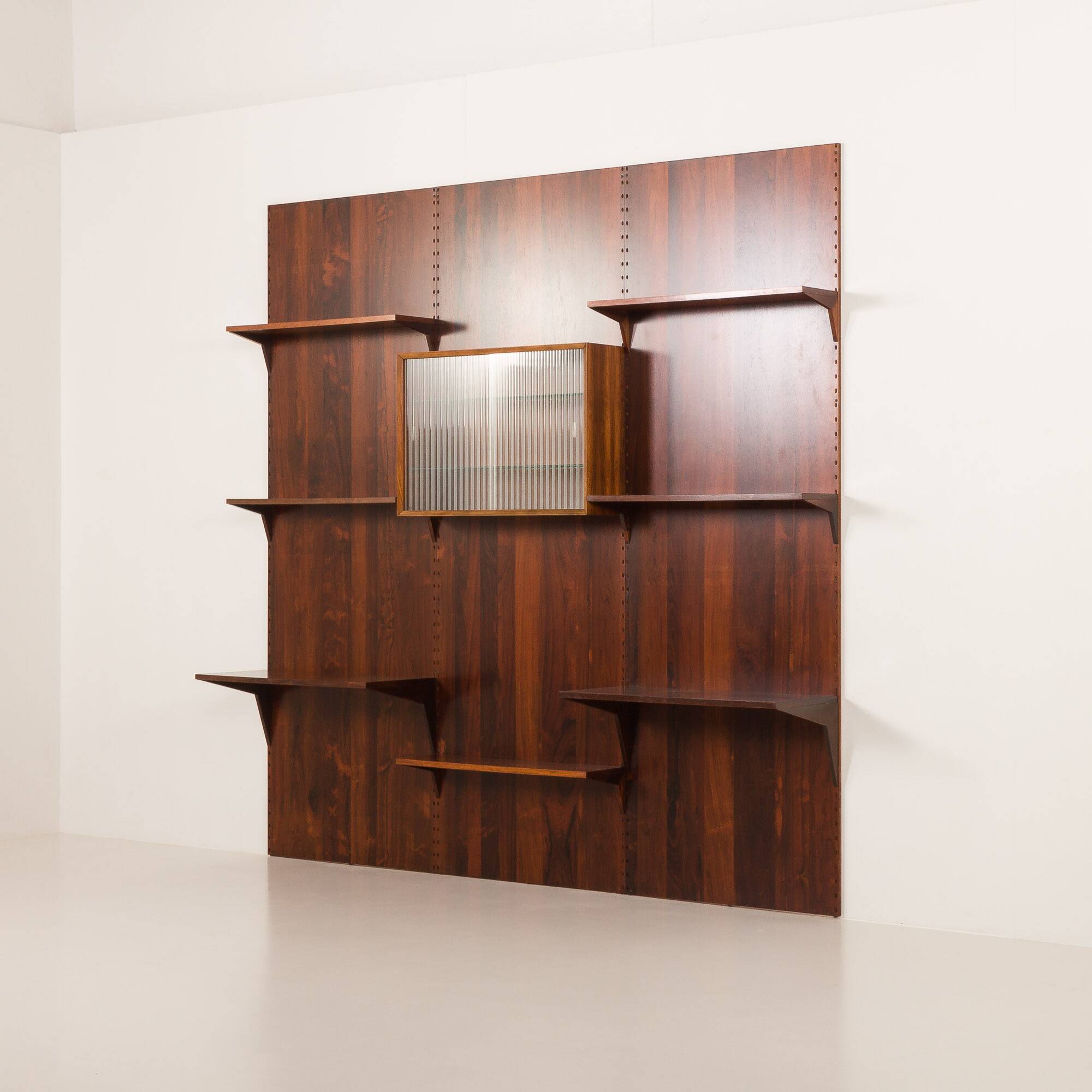 Poul Cadovius rosewood wall unit on panels for Cado, Denmark 1960s