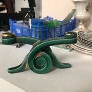 Art Deco candlestick in green and gold earthenware.