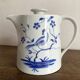Porcelain teapot with hand-painted bird decoration